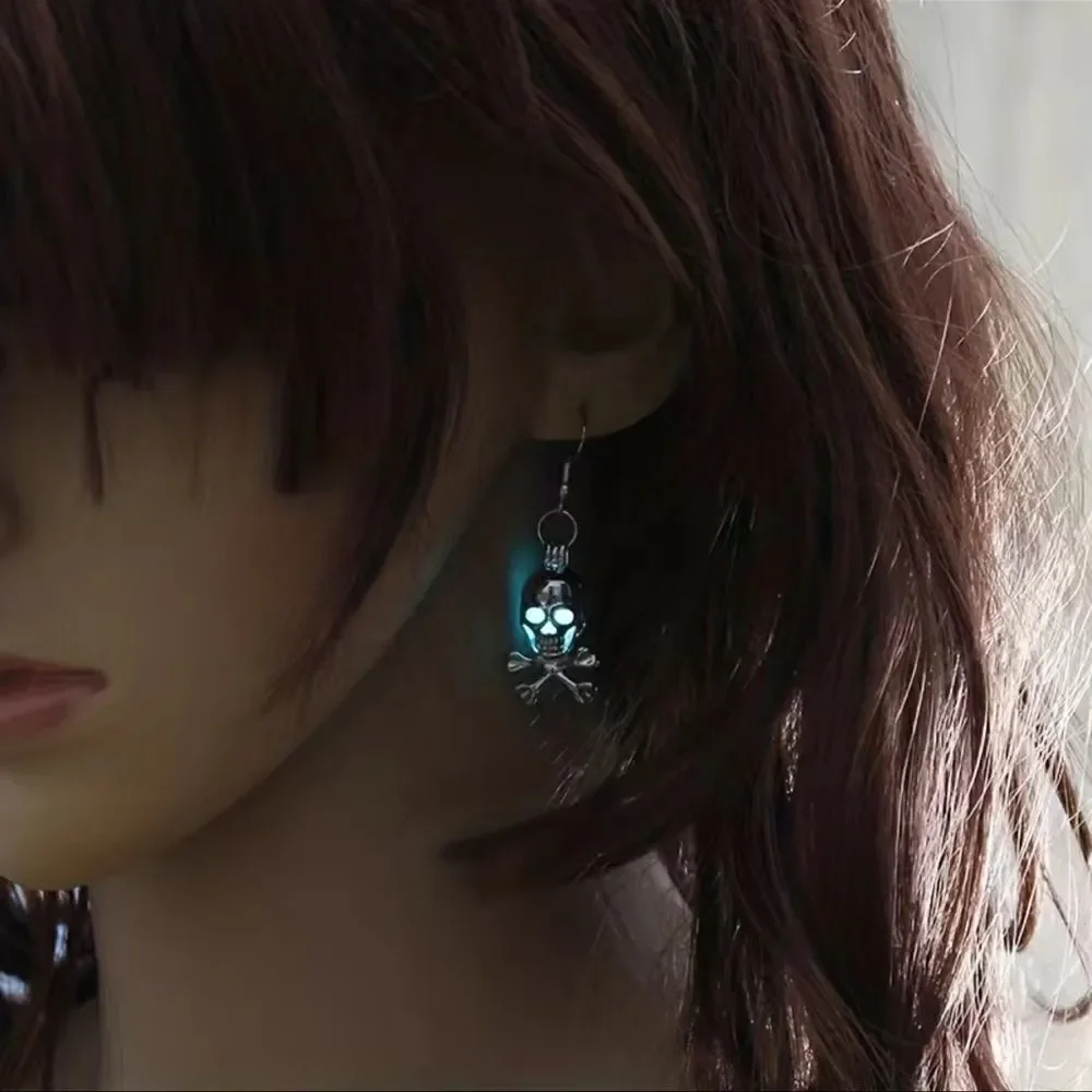 Luminous skull, head dangle earrings.Alloy material, measurements, and pictures.